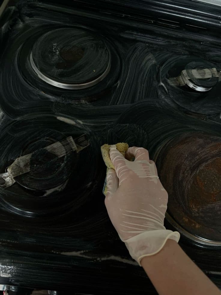 Stovetop — grease lifted, glass restored